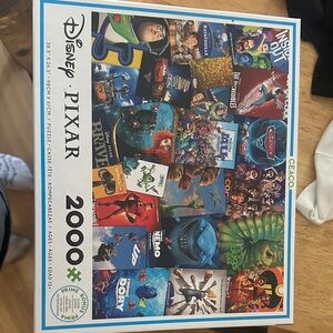 Disney Pixar Collage Puzzle — Blue, Red, Green Accents
